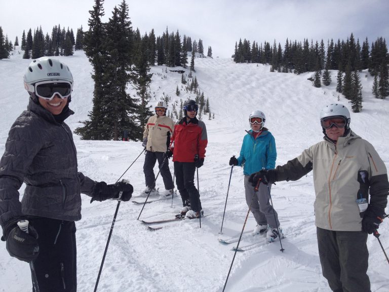 Skiers out on the snow.